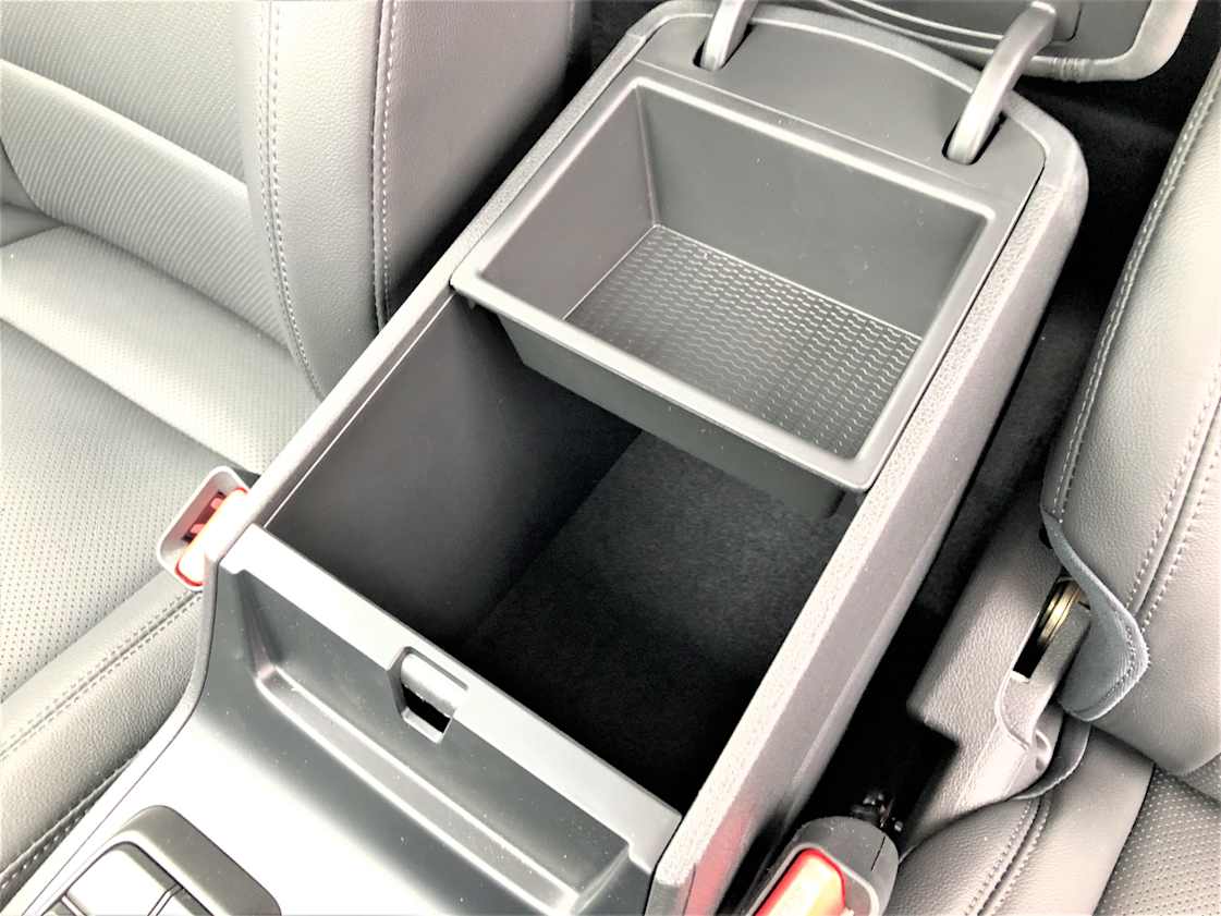 There’s a deep, but narrow, centre console storage bin.